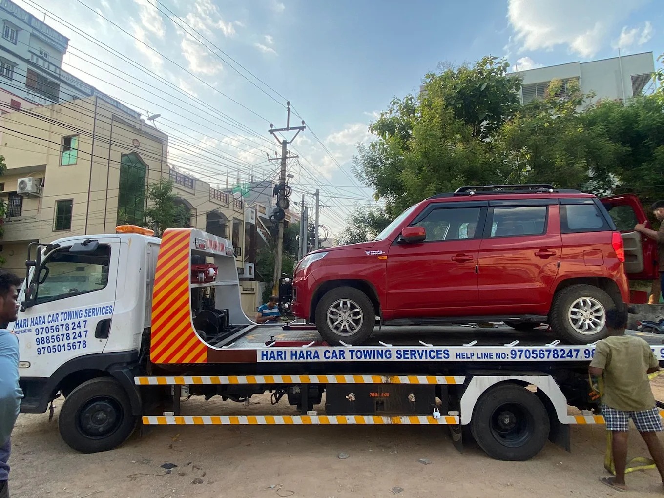 Car being towed in Ibrahimpatnam